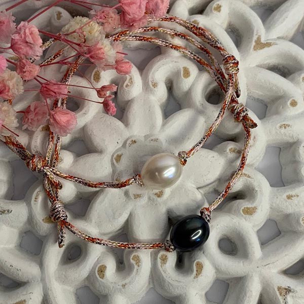 Duo cord bracelet of oval freshwater pearls 7