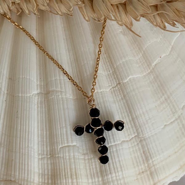 Gold plated chain necklace with small onyx cross