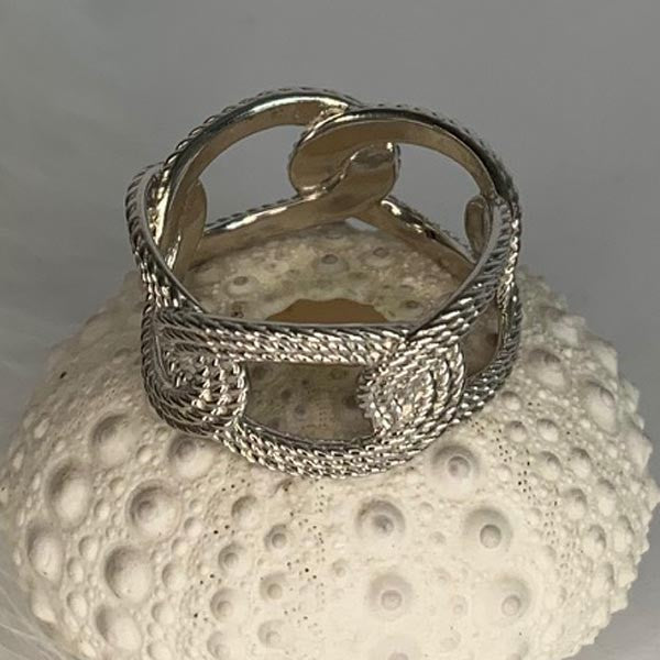 Silver ring with twisted oval links