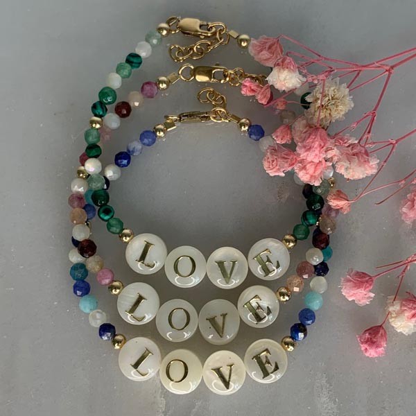 Gold plated Love bracelet with green stones