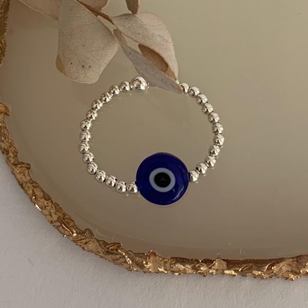 Mini silver pearl ring with blue eye