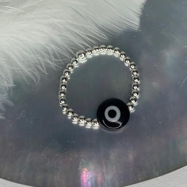 Mini silver pearl ring with black eye