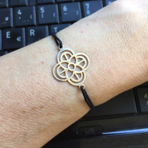 Silver cross flower cord bracelet