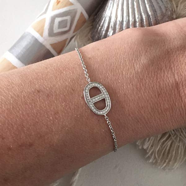 Silver chain bracelet with zircon link