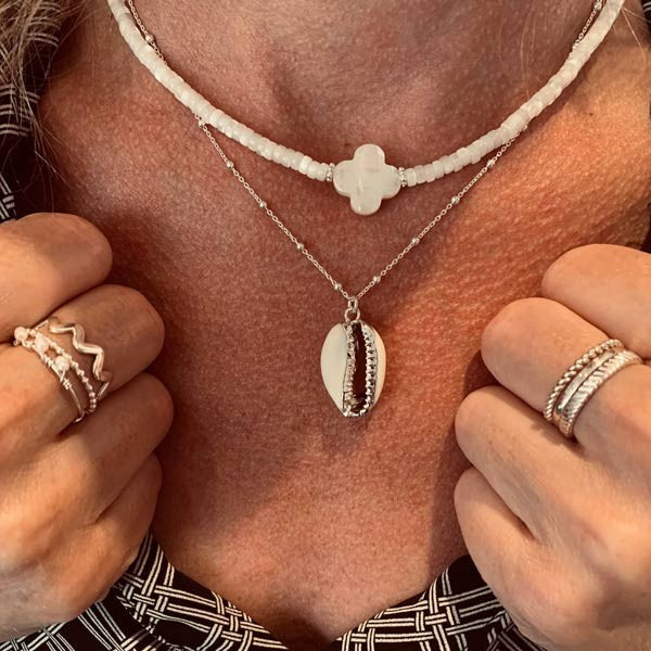 Heishi necklace with white mother-of-pearl cross and pearls