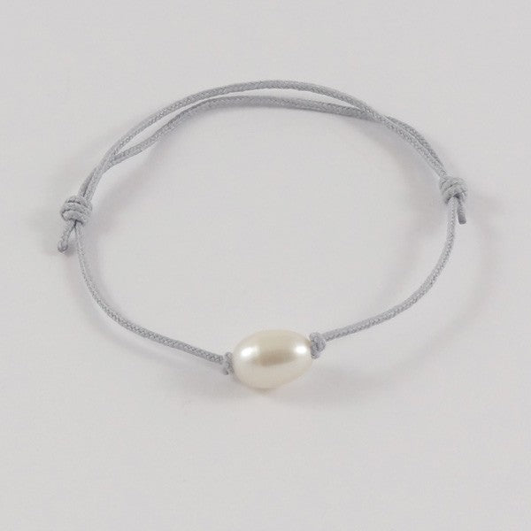 Bracelet cordon perle d'eau douce blanche ovale
