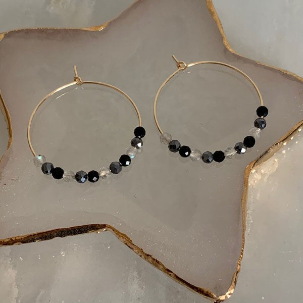 Gold plated hoop earrings with gray stones