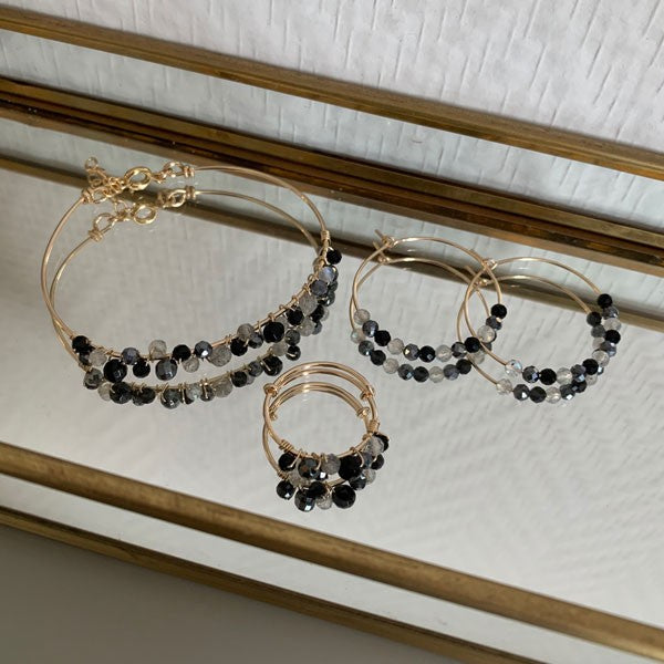 Gold plated hoop earrings with gray stones