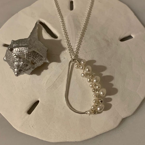 Silver chain necklace with white freshwater pearl drops