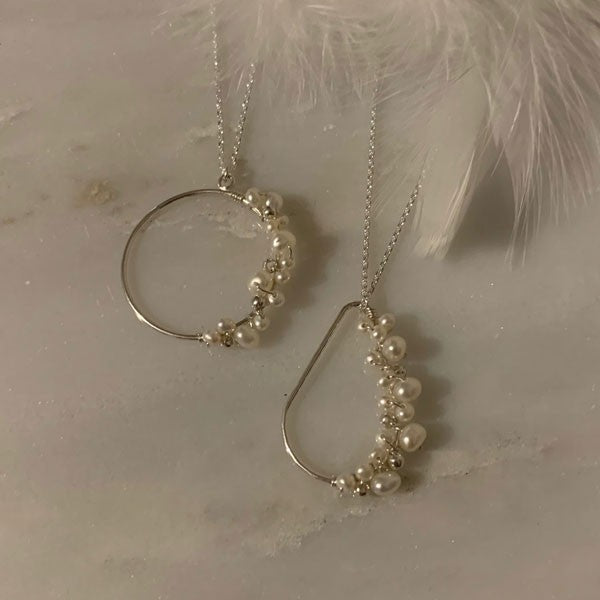 Silver chain necklace with white freshwater pearl drops