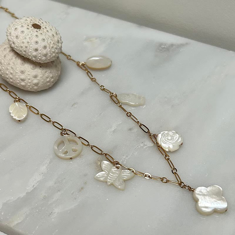 Gold plated chain necklace with 7 small white pearls