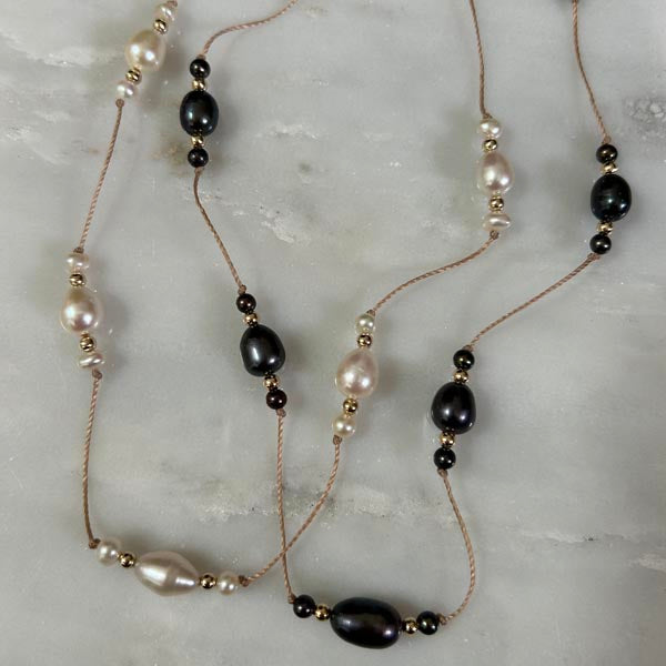Gold plated chain necklace with oval faceted blue chalcedony