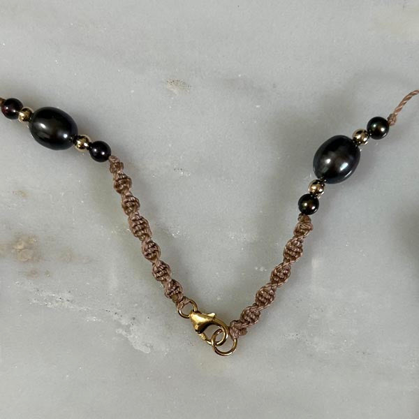Gold plated chain necklace with oval faceted blue chalcedony