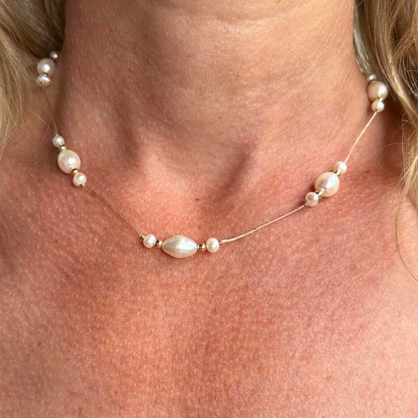 Collier cordon 7 perles ovales blanches