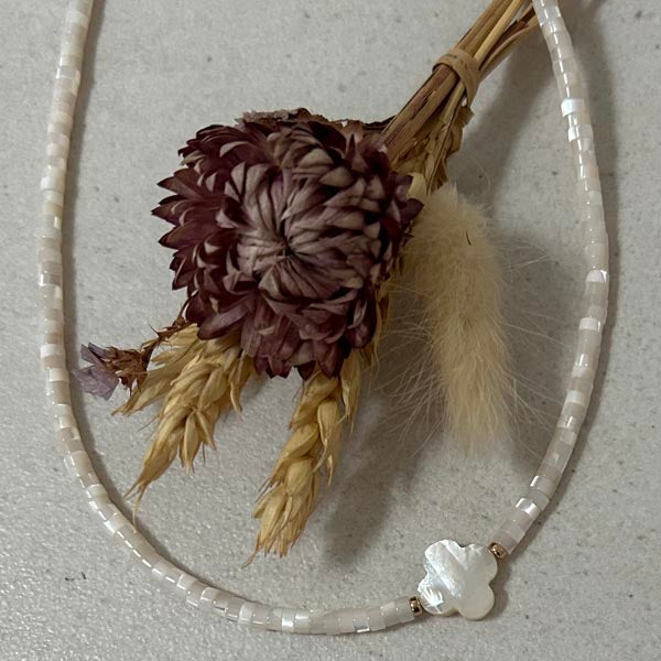 Heishi necklace with white mother-of-pearl cross and pearls