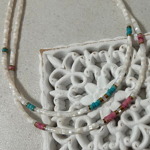 Heishi necklace with white mother-of-pearl cross and pearls