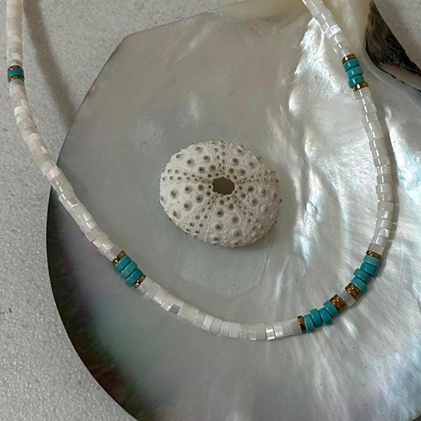 Heishi necklace with white mother-of-pearl cross and pearls