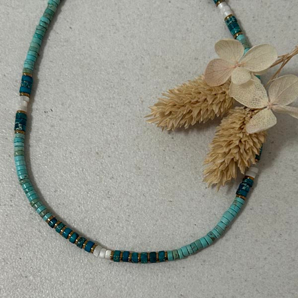 Heishi necklace with white mother-of-pearl cross and pearls