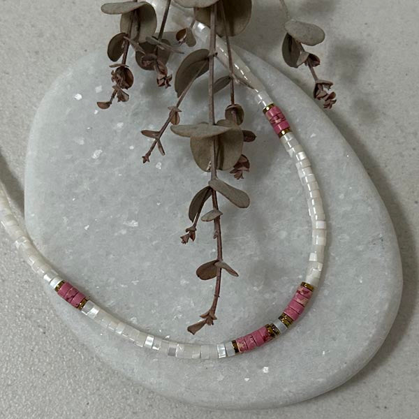 Heishi necklace with white mother-of-pearl cross and pearls