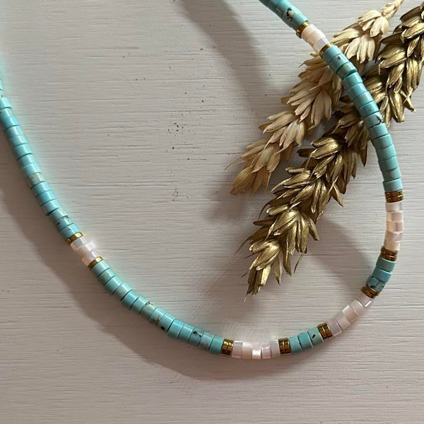 Heishi necklace with white mother-of-pearl cross and pearls