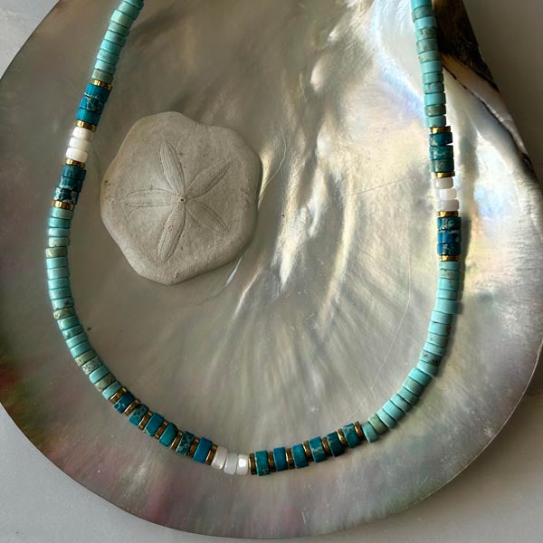 Heishi necklace with white mother-of-pearl cross and pearls
