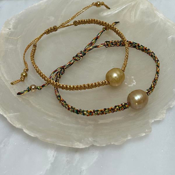 Duo cord bracelet of oval freshwater pearls 9