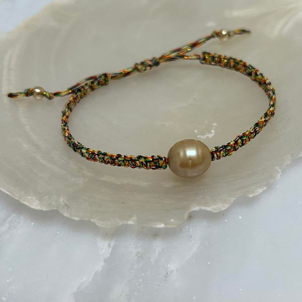 Duo cord bracelet of oval freshwater pearls 9