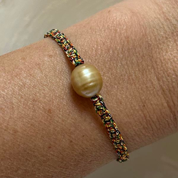 Duo cord bracelet of oval freshwater pearls 9