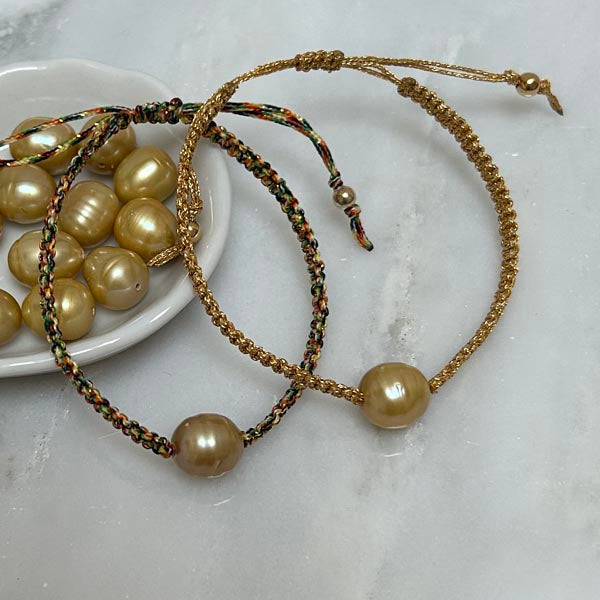 Duo cord bracelet of oval freshwater pearls 9