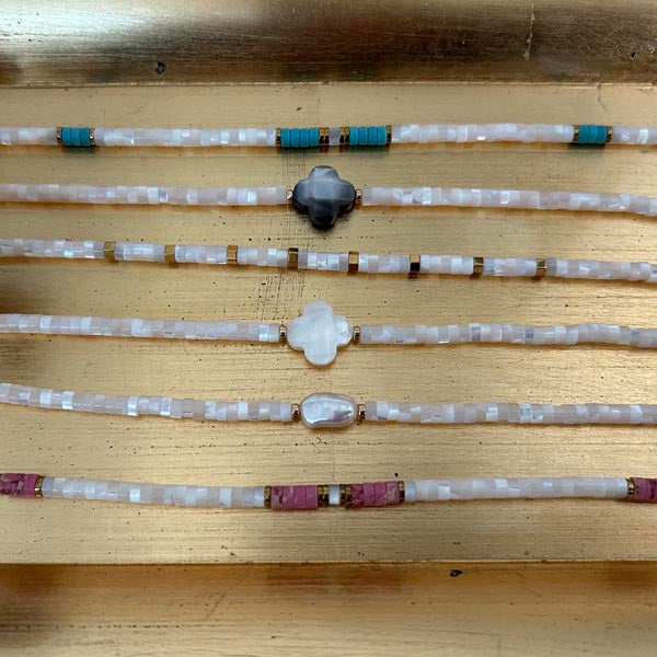 Heishi necklace with white mother-of-pearl cross and pearls