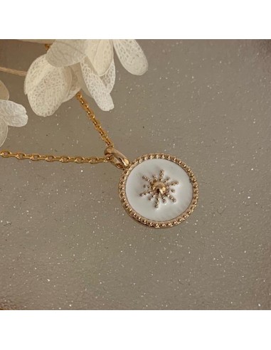 Gold plated white medal with star...