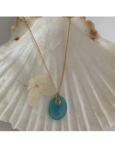 Gold plated faceted blue oval...