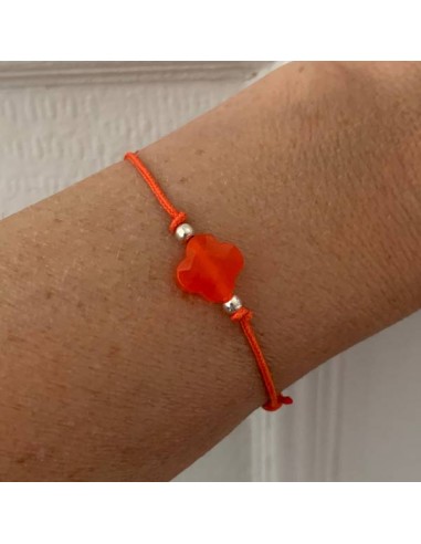 Small orange cross and silver beads...