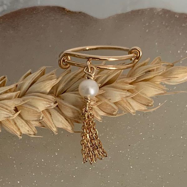 Thin gold filled ring with white pearl pompom