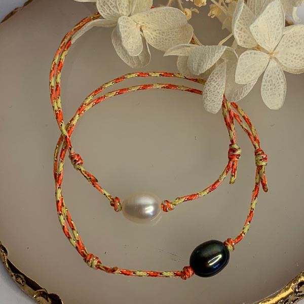 Duo cord bracelet of oval freshwater pearls 6