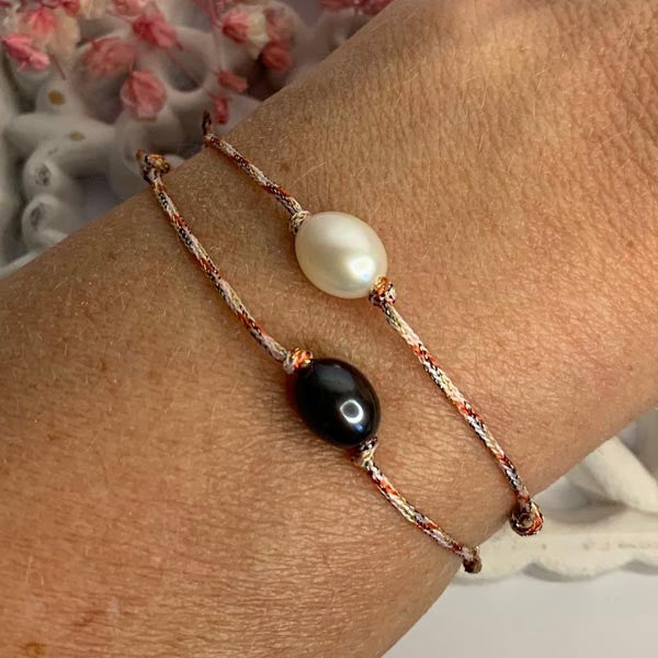 Duo cord bracelet of oval freshwater pearls 7