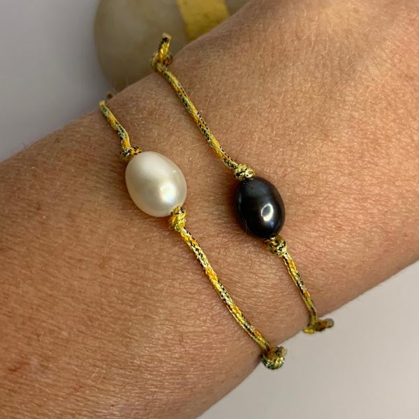 Duo cord bracelet of oval freshwater pearls 1