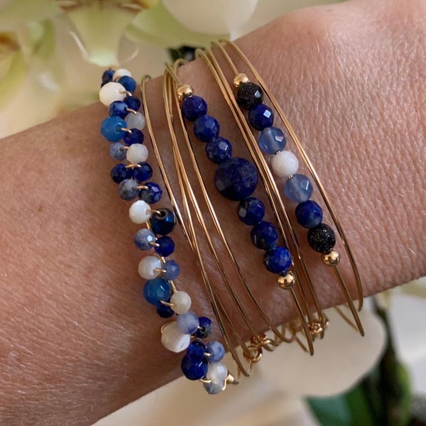 Fine gold filled bangle bracelet with blue stones