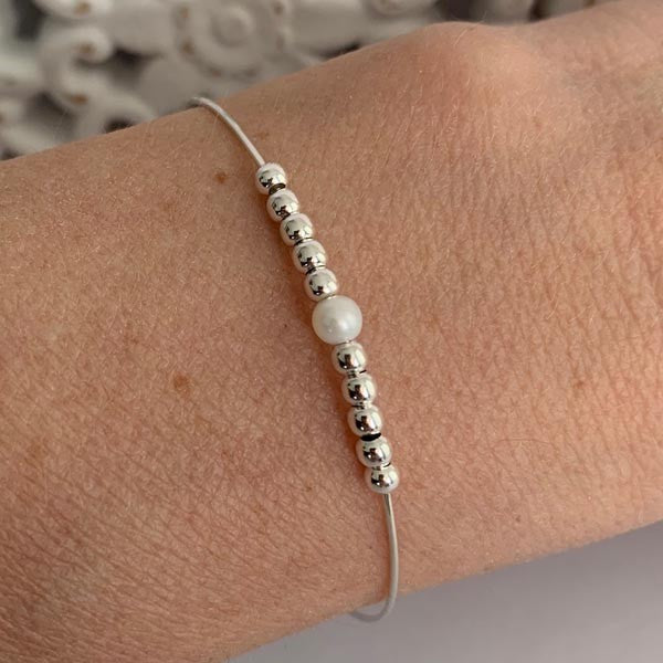 Fine silver bangle bracelet with 11 beads 1