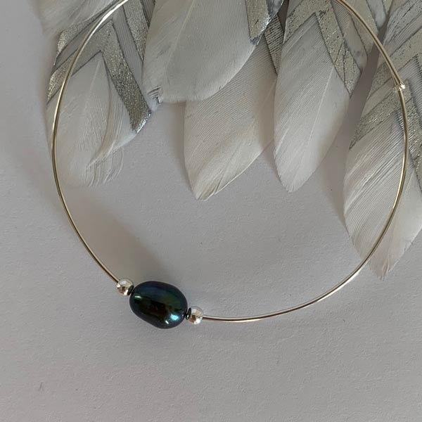 Fine silver bangle bracelet with black pearl beads