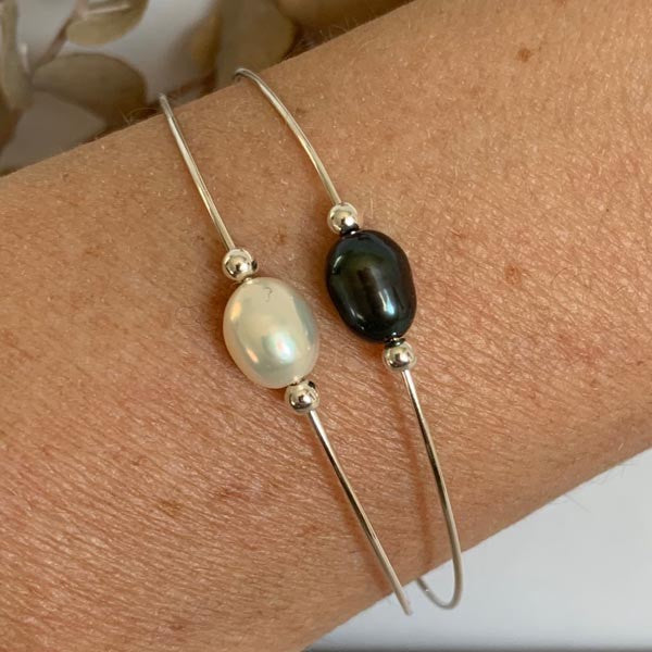 Fine silver bangle bracelet with black pearl beads