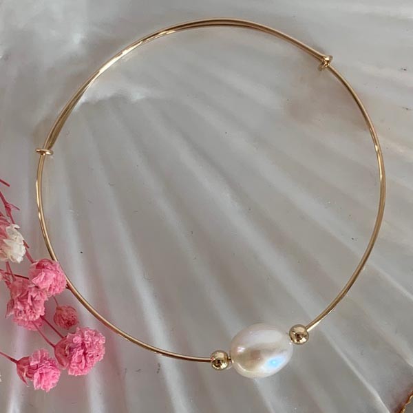 Fine gold filled bangle bracelet with white oval pearls