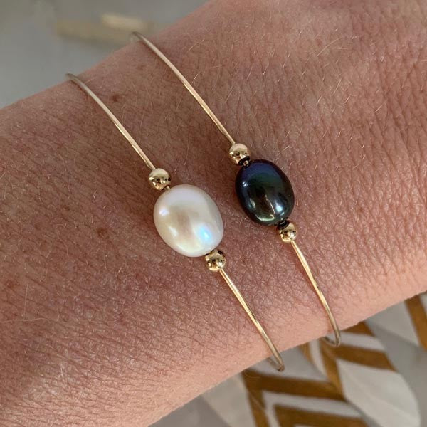 Fine gold filled bangle bracelet with white oval pearls