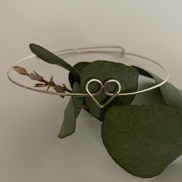 Thin silver heart bangle bracelet