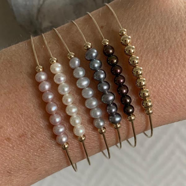 Bracelet jonc fin gold filled 7 perles blanches