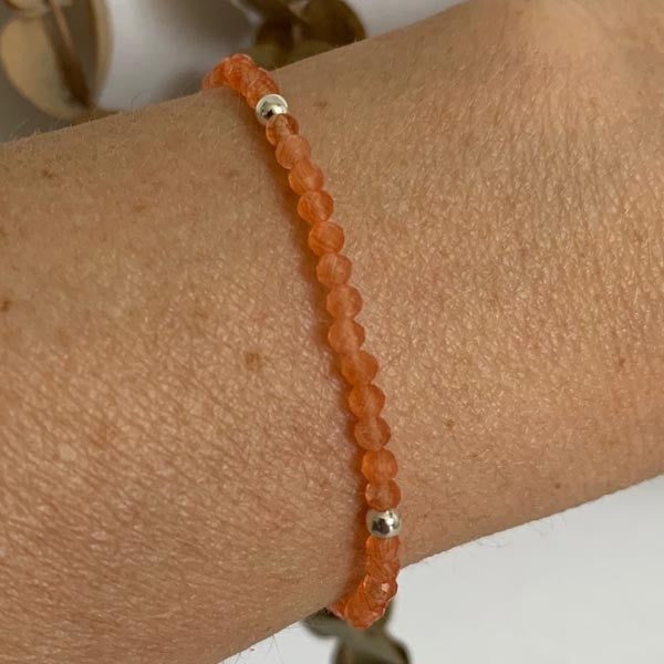 Orange cat's eye silver bracelet