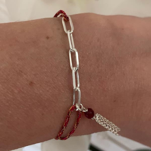 Red cord bracelet 5 silver links pompom