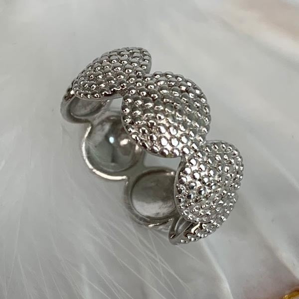 Silver ring with pearly rounds