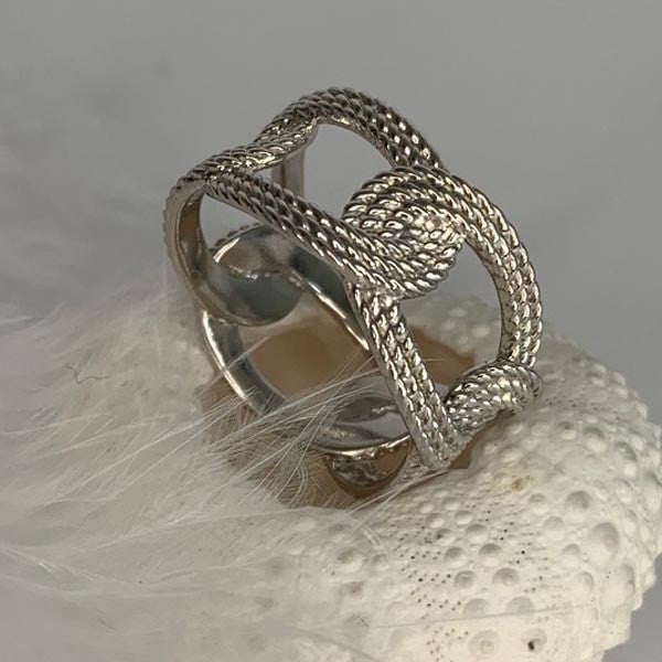 Silver ring with twisted oval links 