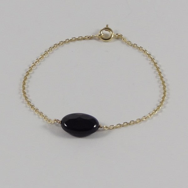 Gold plated chain bracelet with faceted oval onyx